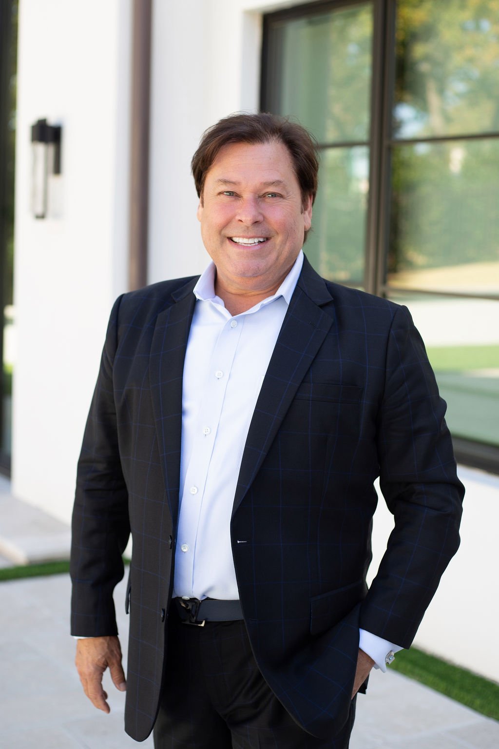 Troy George, Broker and Co-Owner of Synergy Realty